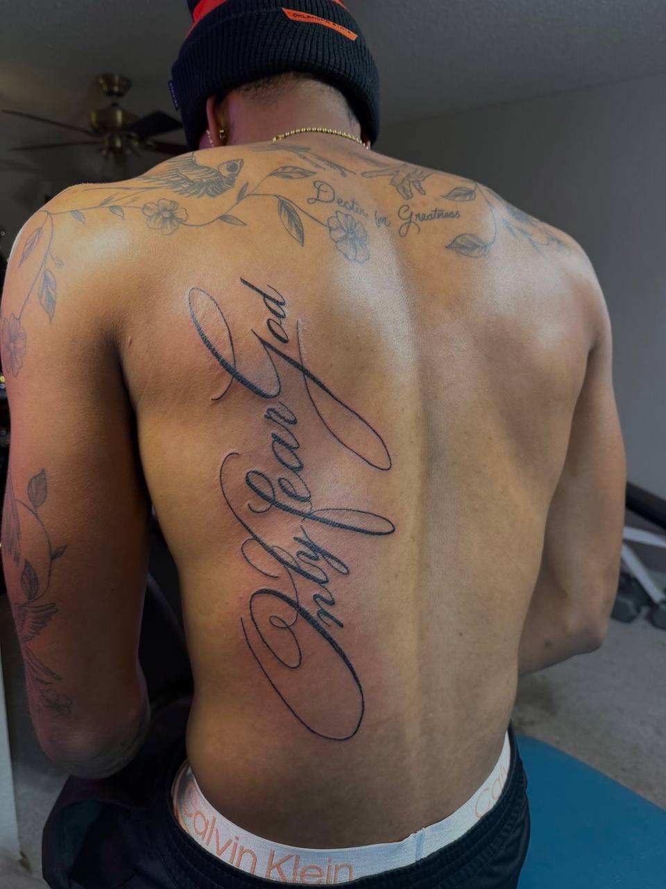 Large script lettering back piece